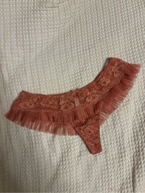 NWT Victoria’s secret orange ruffle lace frilly thong Medium